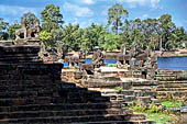 Angkor - Srah Srang, a small reservoir embellished by a platform with access stairs to the water.